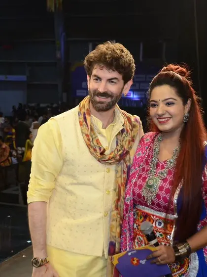 With the star cast of the movie 'GOATs', including Neil Nitin Mukesh, at 'Rangilo Re'. I have extensive experience managing movie promotions and celebrity interactions at large events.