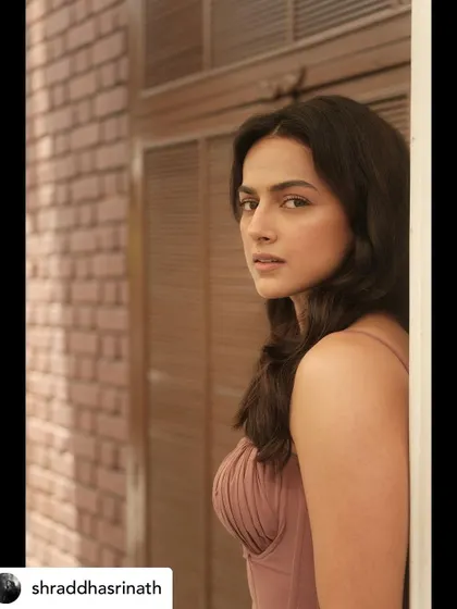 A side profile shot that captures the soft, romantic feel of this look, with a focus on natural beauty and understated elegance.