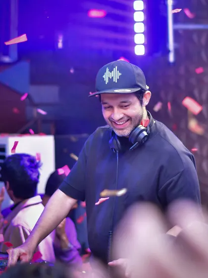 A candid of me smiling, surrounded by confetti.