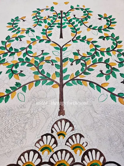 A work-in-progress view of a 'Tree of Life' painting in the Kalamkari style. The leaves are being colored in green and yellow, but the peacocks at the base are still outlines.