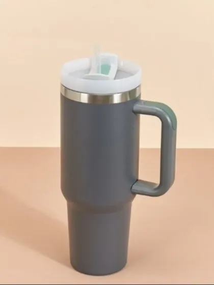 Here is the large 1-liter stainless steel travel mug in a sleek grey color. It's a practical and durable choice for daily use.