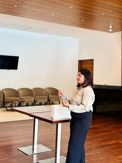 Here I am leading a wardrobe organizing workshop. I love teaching practical tips to help people simplify their closets. I offer these hands-on experiences for communities and workplaces.