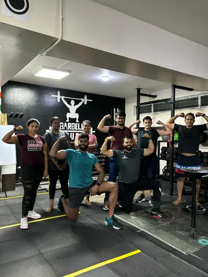 The evening crew celebrating the end of another challenging functional fitness workout.