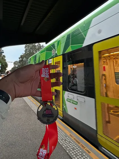 The reward. Taking the train home with a new medal. This is the tangible result of all your hard work and dedication, a reminder of what you've accomplished.