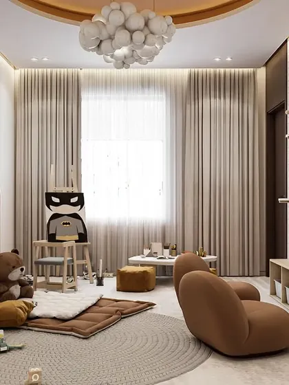 A beautifully designed playroom in soft, neutral tones. The space features custom cabinetry with arched nooks, a pegboard wall for flexible shelving, and plenty of floor space for play.