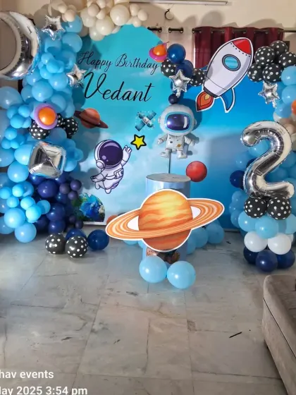 A wide shot of the space-themed birthday party decor.