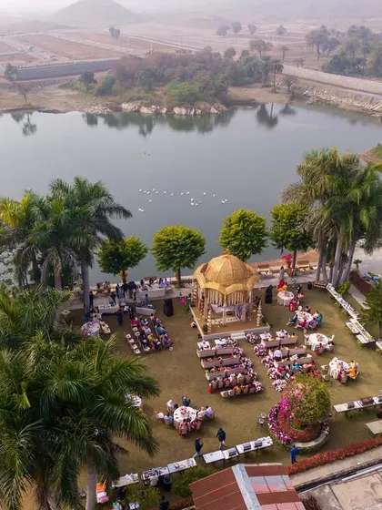 This aerial view highlights the harmony between the natural landscape and the elegant wedding setup, a key aspect of my destination wedding planning.