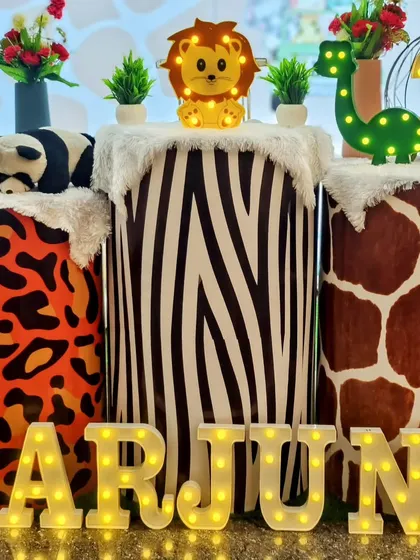Another detail shot of the custom pedestals for the jungle safari theme.