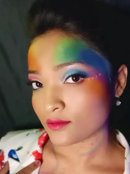 A playful and artistic shot of the Holi-inspired look, showing how creative makeup can be used for expressive photoshoots.