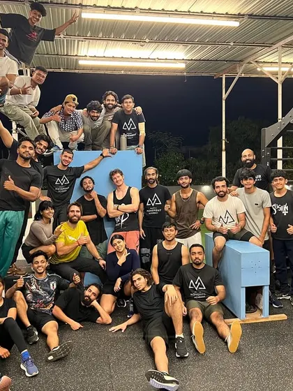 The full group from one of our workshops with international coaches. The energy and passion for movement in this picture are what our community is all about.