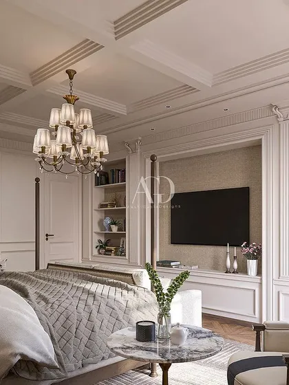 The classic four-poster bed is given a modern interpretation in this design. The room also features built-in shelving for a television and decor, seamlessly blending modern needs with timeless style.