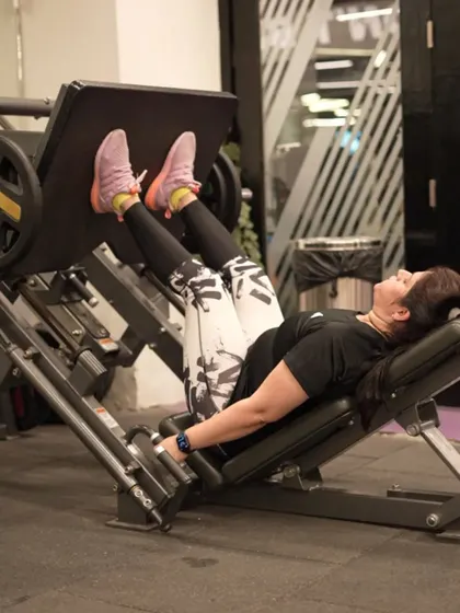 The leg press machine is a safe and effective way to build serious lower body strength, targeting the quadriceps, hamstrings, and glutes.