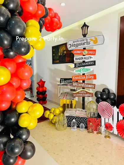 Explore the details of my Harry Potter decorations, from a "Welcome to Hogwarts" signpost to props like the Golden Snitch, Hedwig, and floating keys, creating a truly magical experience.