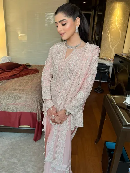 Glowing from within! Shubhangi's Roka ceremony look is a testament to her inner radiance. We kept it soft and pretty in pink to match her beautiful pastel outfit.