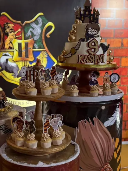 A full Harry Potter dessert table setup featuring our custom cake topper and matching cupcake toppers. We feel so blessed to create these for a loyal client year after year.