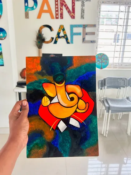 A duplicate of the colorful abstract Ganesha painting.