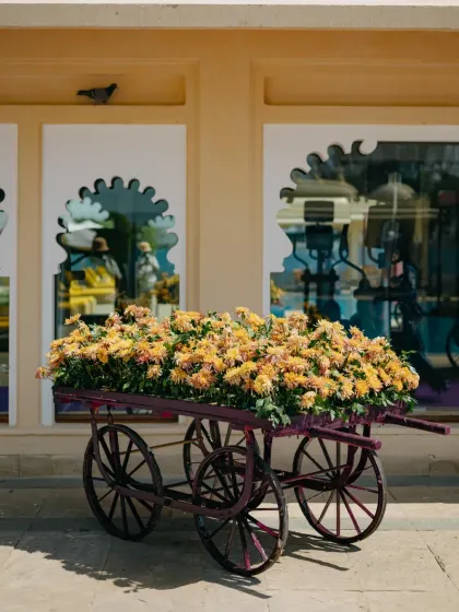 A whimsical "Saturday Market" themed event in Udaipur, with custom-designed stalls for a Chai House, Frozen Yoghurt, and Ice Gola, complete with unique branding and playful decor.