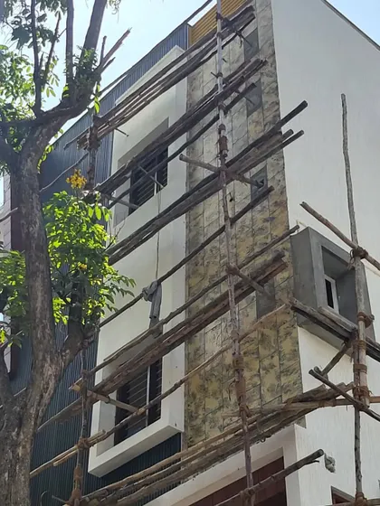 A close-up of the newly applied stone cladding, highlighting the texture and pattern.