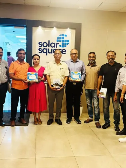 The management committee of a large housing society visits our office to finalize their solar project.