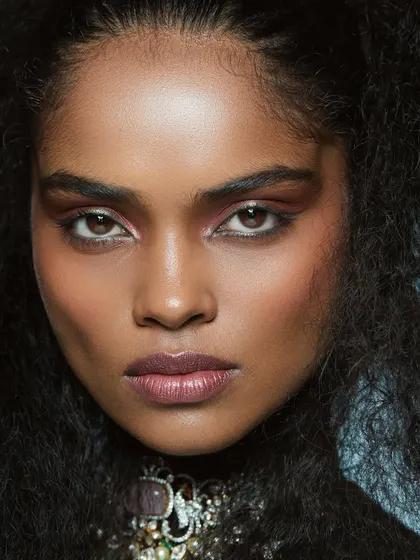 A student from our Mumbai academy created this stunning look, featuring voluminous natural hair and sculpted glam, elevated with statement jewels.