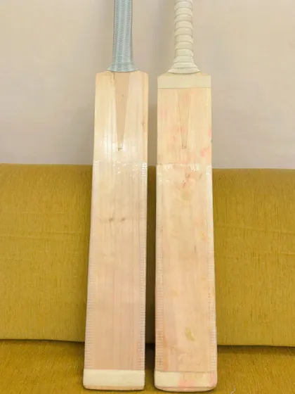 A look at the front face of two new cricket bats. A good bat should have clean grains, good balance, and a great 'ping' off the face.