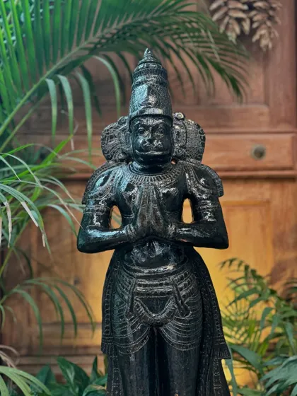 The full view of our standing Anjali mudra Hanuman, a handcrafted black granite statue that brings a sense of devotion and peace.