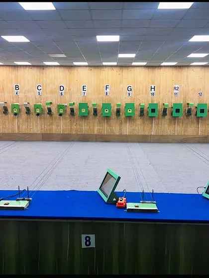 This is our state-of-the-art, air-conditioned 10-meter indoor shooting range. It is equipped with 14 electronic targets that provide instant and accurate scoring analysis, creating a professional environment for both beginners and competitive athletes.