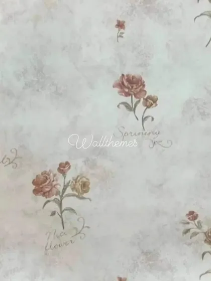 A close-up of a wallpaper with a scattered rose pattern and subtle script text.