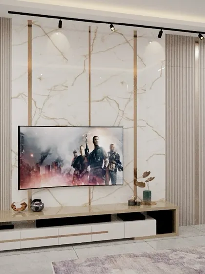 A 3D render of a luxurious TV wall with marble-finish panels, gold-colored inlays, and integrated track lighting for a sophisticated entertainment zone.