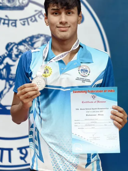 Utkarsh Patil with his silver medal in the Men's 100m Backstroke.