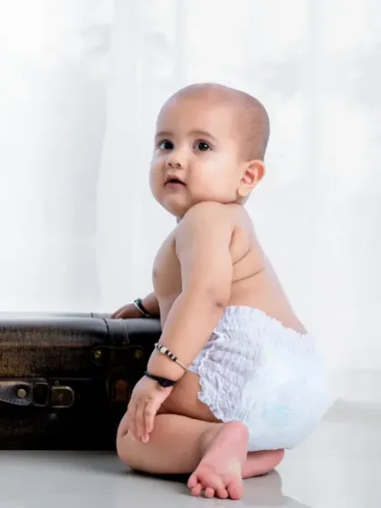 The tiniest feet make the biggest footprints in our hearts. A classic baby portrait.