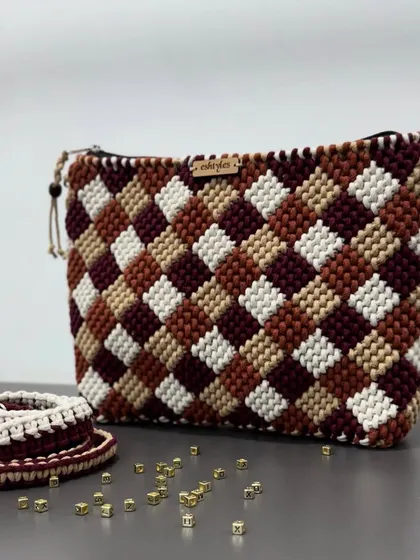 This popular checkered pattern bag is ready to be personalized. Just tell me your preferred colors and bag type, and I'll craft it for you.