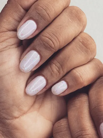 An opal creation. This glittery polish has a beautiful iridescent shine that looks like crushed opals.