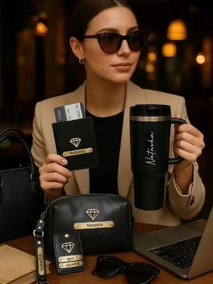 This is my vision for the modern professional. This curated set features a personalized vegan leather passport cover, a matching pouch and luggage tag, and a custom-engraved tumbler, all in a sleek black finish. It’s the perfect gift to empower the boss lady in your life.
