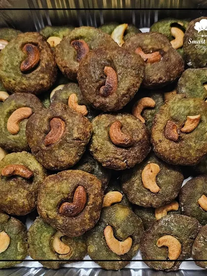 Delicious baked cookies topped with cashews, a simple yet elegant starter or snack.