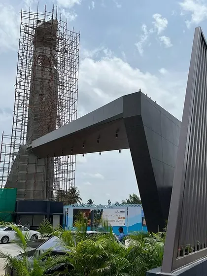 A collection of images and videos documenting various stages of construction, from site visits and foundation work to the detailed installation of architectural fittings and finishes.