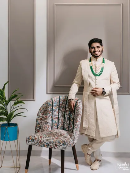 A stylish portrait of the groom, Mahek, looking confident and happy, ready to meet his bride.