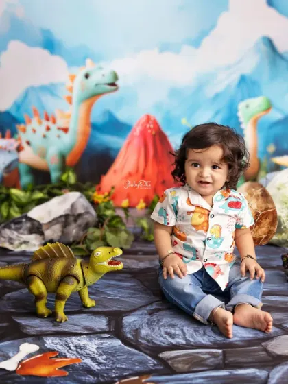 This little one is sitting so proudly amongst the dinosaurs. Sitter sessions are a great time to capture your baby as they learn to explore the world around them.