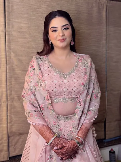 A stunning Roka ceremony look. This bride chose a beautiful pink floral lehenga, and we created a soft, romantic makeup look to match.