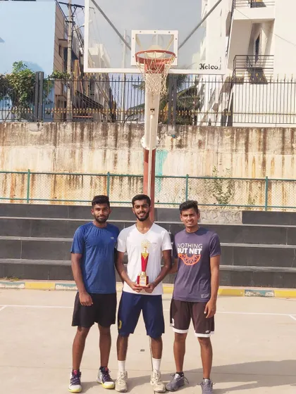 Posing with the runner-up trophy at the MEI Cup.