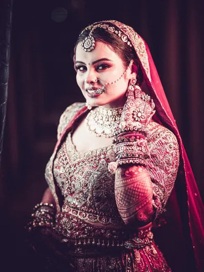 A stunning, dramatic portrait of the bride, with intense lighting.