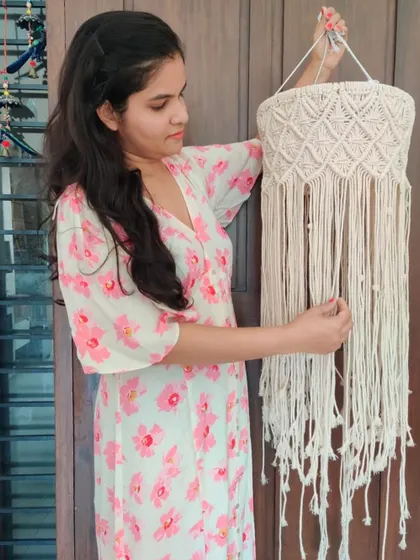 This was my first-ever order, a macrame chandelier. I remember feeling so nervous and excited while making it. It's a special piece that will always remind me of the beginning of my journey.
