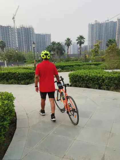 A rider walking his bike through the beautiful landscapes of Ved Van. Sometimes it's good to slow down and soak in the serenity.