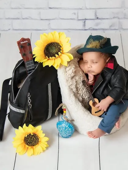 For the Bollywood-loving family, here is our little Raj from DDLJ. Complete with a mandolin and a field of sunflowers, this theme is a fun and unique nod to a classic love story.