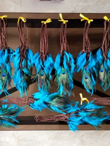 A bulk order of our feather headbands, customized for a Boho-themed event. These are a fun and stylish hair accessory for any bohemian party.
