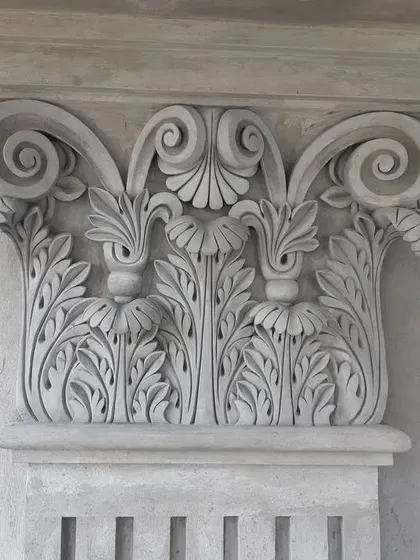 My work is not just about large murals. I also craft fine architectural details like this ornate pillar capital. This type of intricate cement carving adds a touch of timeless elegance and sophistication to any structure, inside or out.