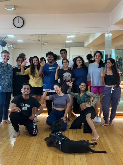 A group photo from our Afro-Cuban class, full of sass, fan flair, and Ochún vibes. It's always a good time when we get to explore these cultural movements together.