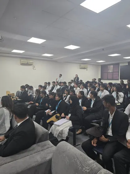 A wide shot of the audience at the POCSO Act seminar. The large turnout of law students shows a promising and genuine interest in understanding and tackling the legal complexities surrounding child protection.