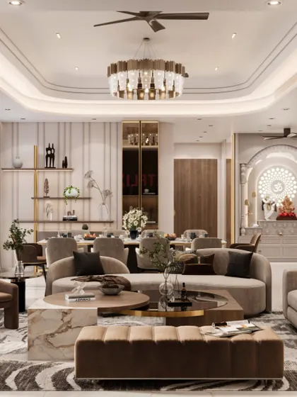 A render of a contemporary living and dining area, featuring a coffered ceiling with elegant chandeliers, a dedicated pooja mandir, and a mix of curved and linear furniture. The design balances modern luxury with traditional elements.