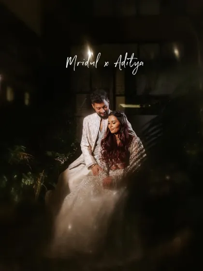 A dreamy, soft-focus portrait of the couple embracing during their Sangeet. The mood is intimate and full of love.